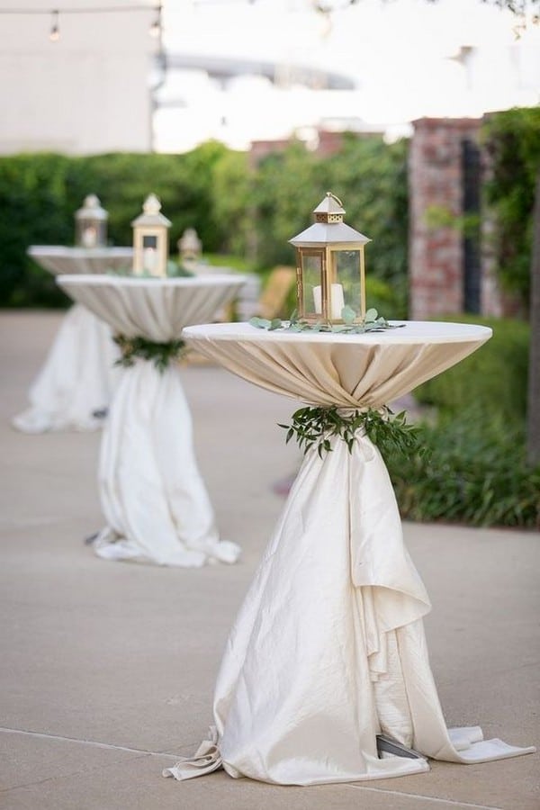wedding cocktail table with lanterns