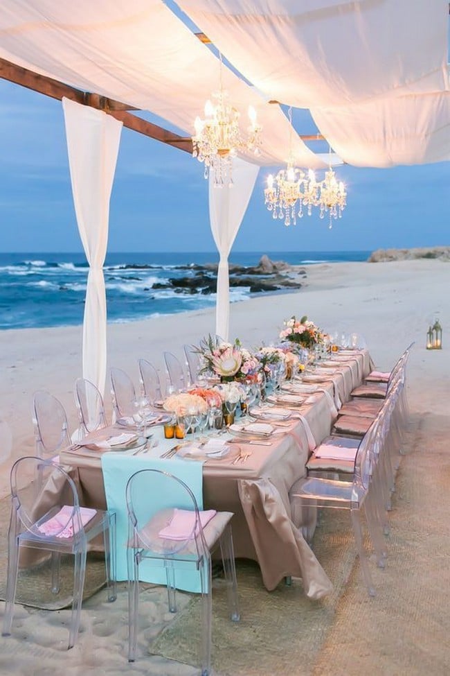 Intimate beach tented blush and tiffany blue wedding reception