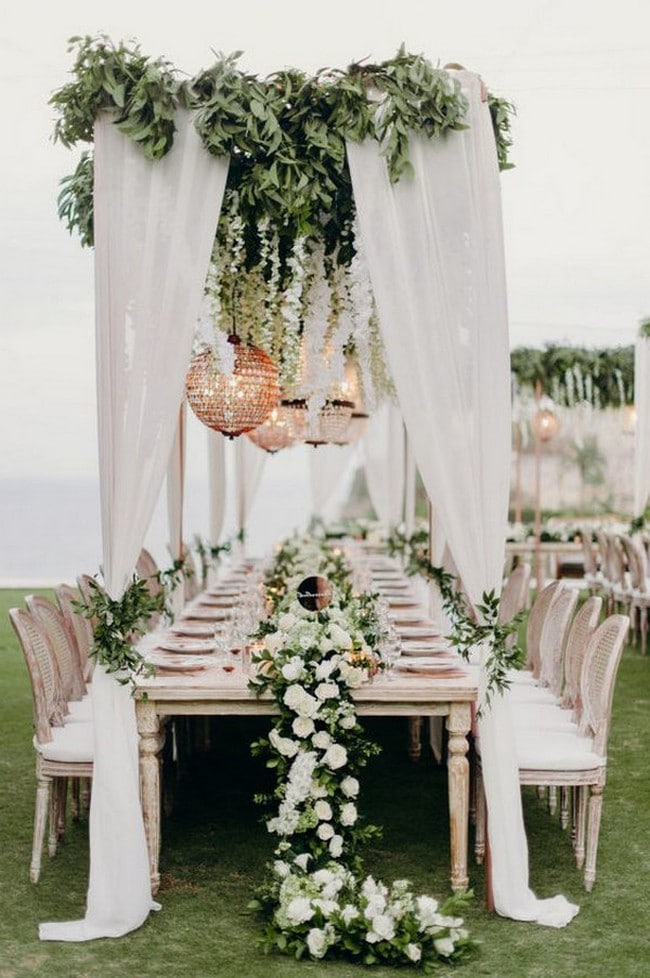 white and greenery beach wedding reception