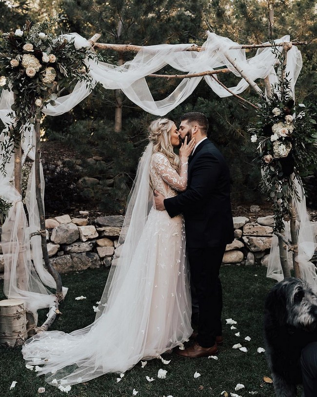 Bride And Groom Under Arch Wedding Photos #wedding #photos #weddingphotos #arches #weddingarches