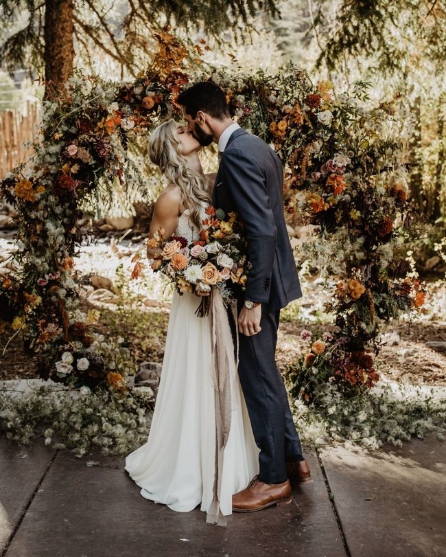 Bride And Groom Under Arch Wedding Photos #wedding #photos #weddingphotos #arches #weddingarches