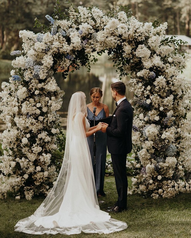 Bride And Groom Under Arch Wedding Photos #wedding #photos #weddingphotos #arches #weddingarches